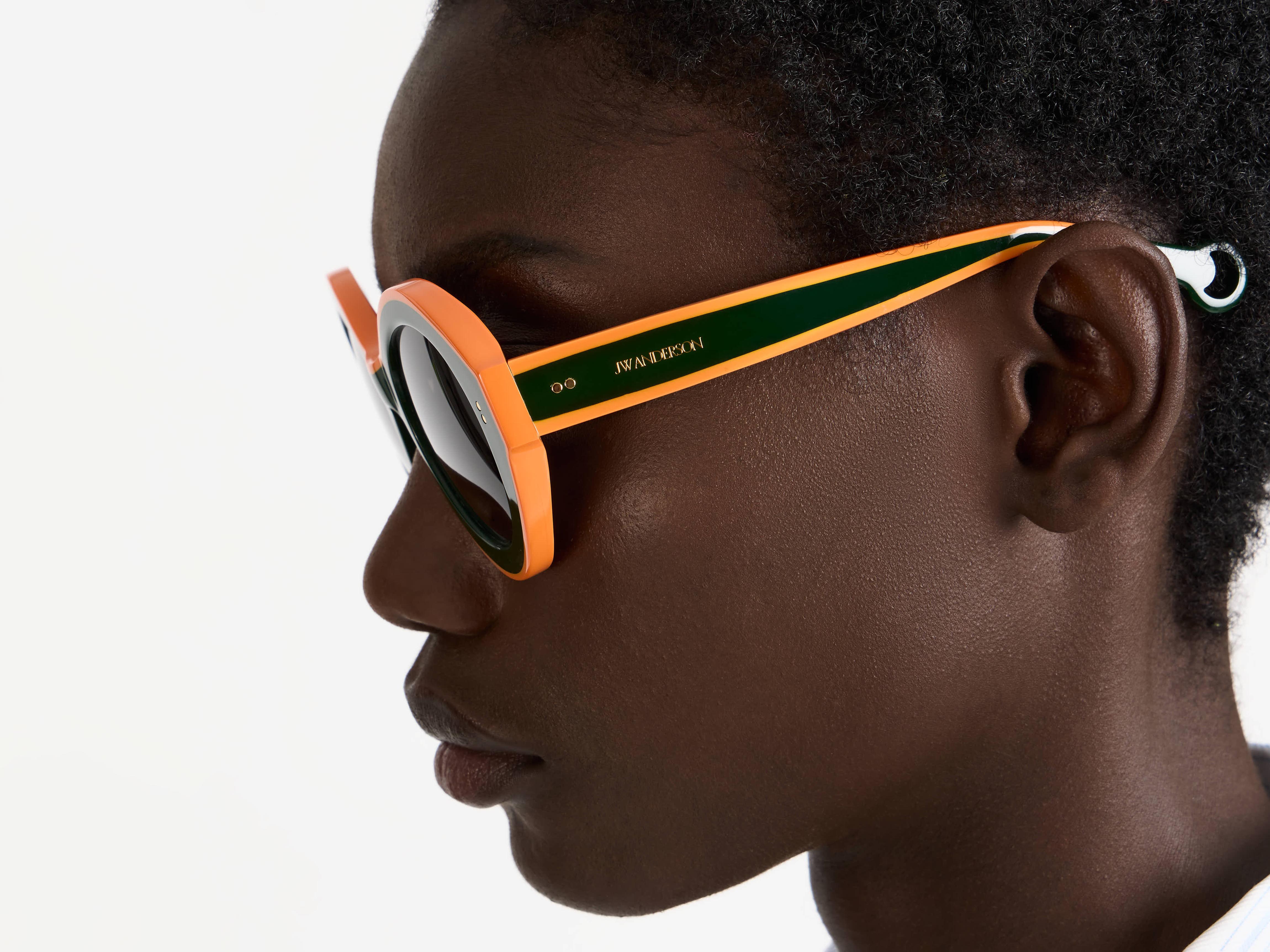 J.W.Anderson JWA07 Bumper Sonnenbrille Grün Orange Acetat