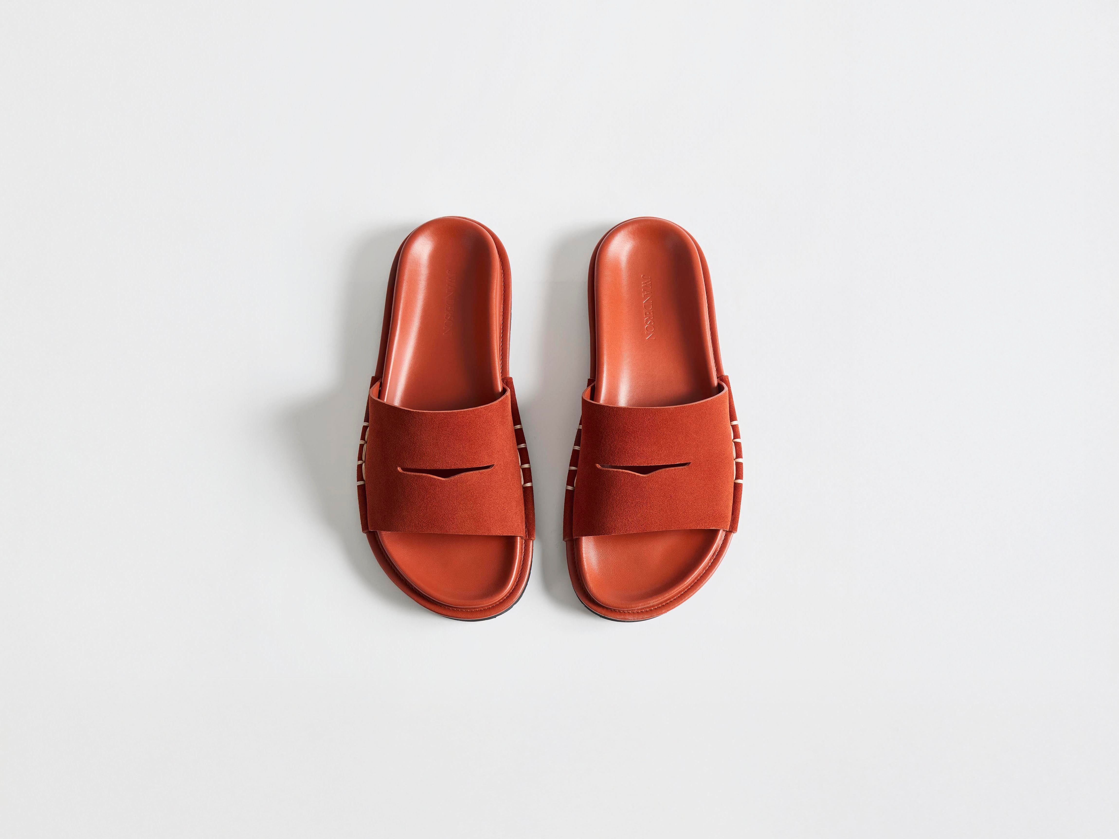 J.W. Anderson Fussbett Loafer Slides Rost Wildleder Herren