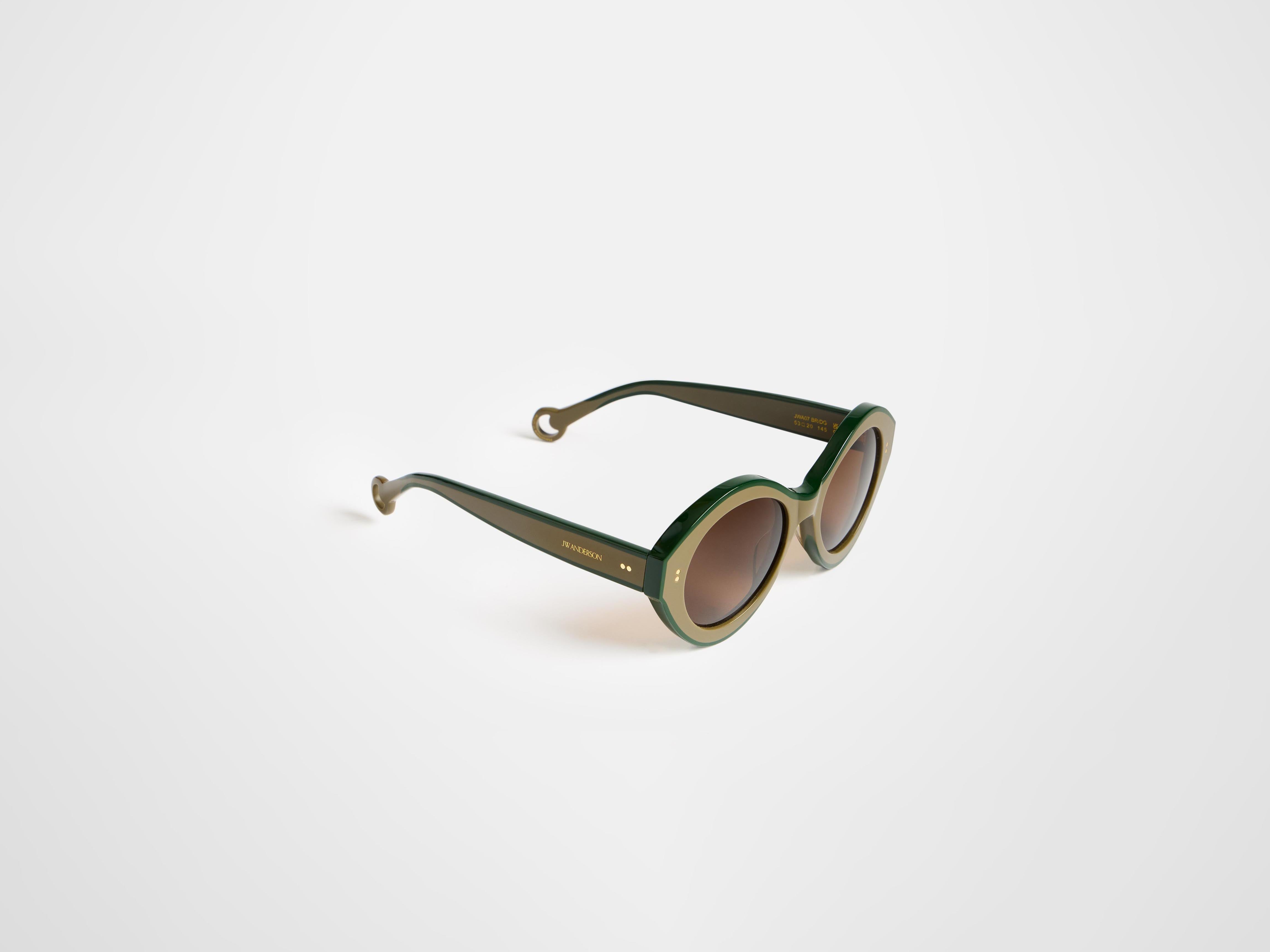 J.W.Anderson JWA07 Bumper Sonnenbrille Braun Grün Acetat
