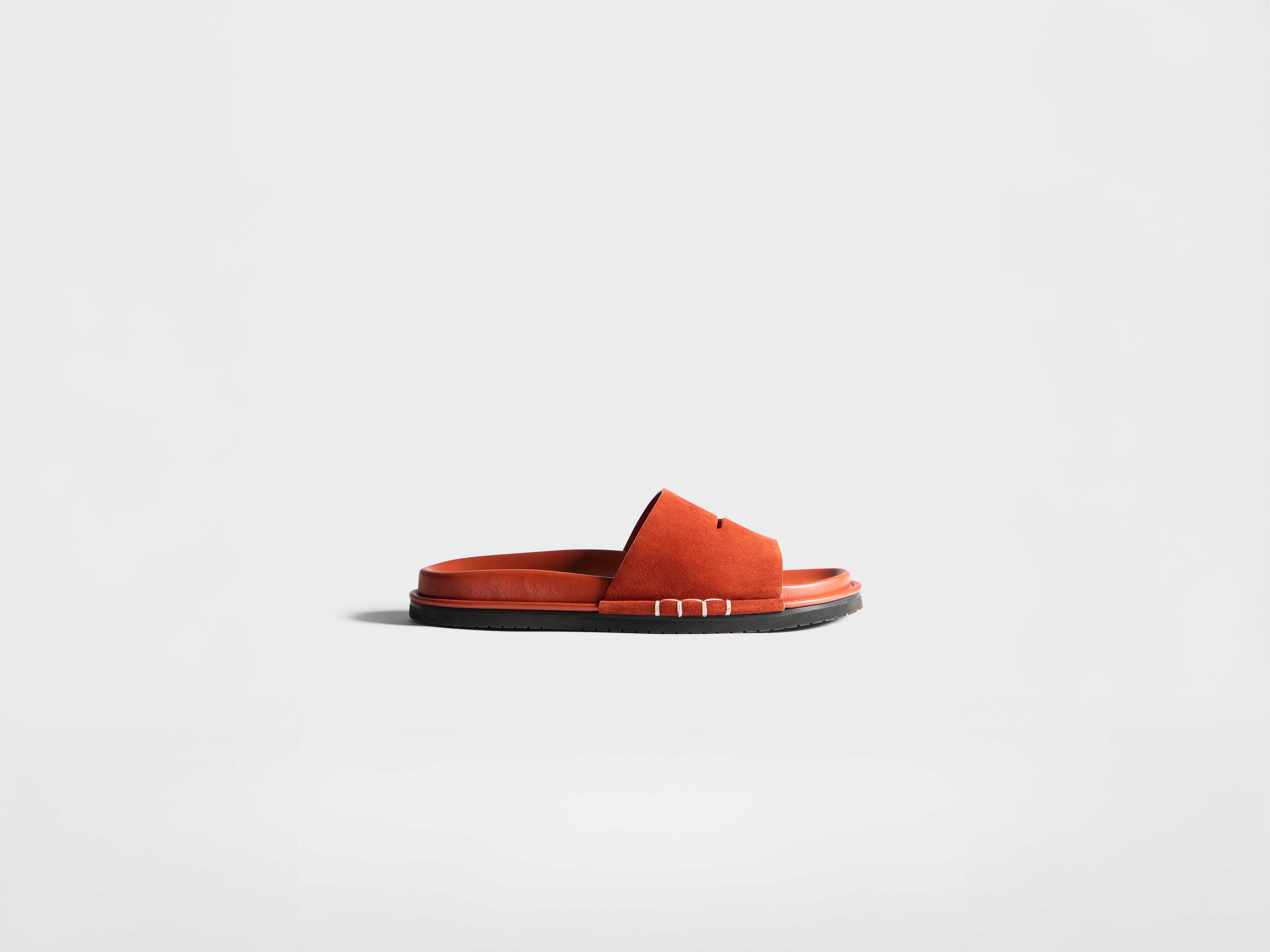 J.W. Anderson Fussbett Loafer Slides Rost Wildleder Herren