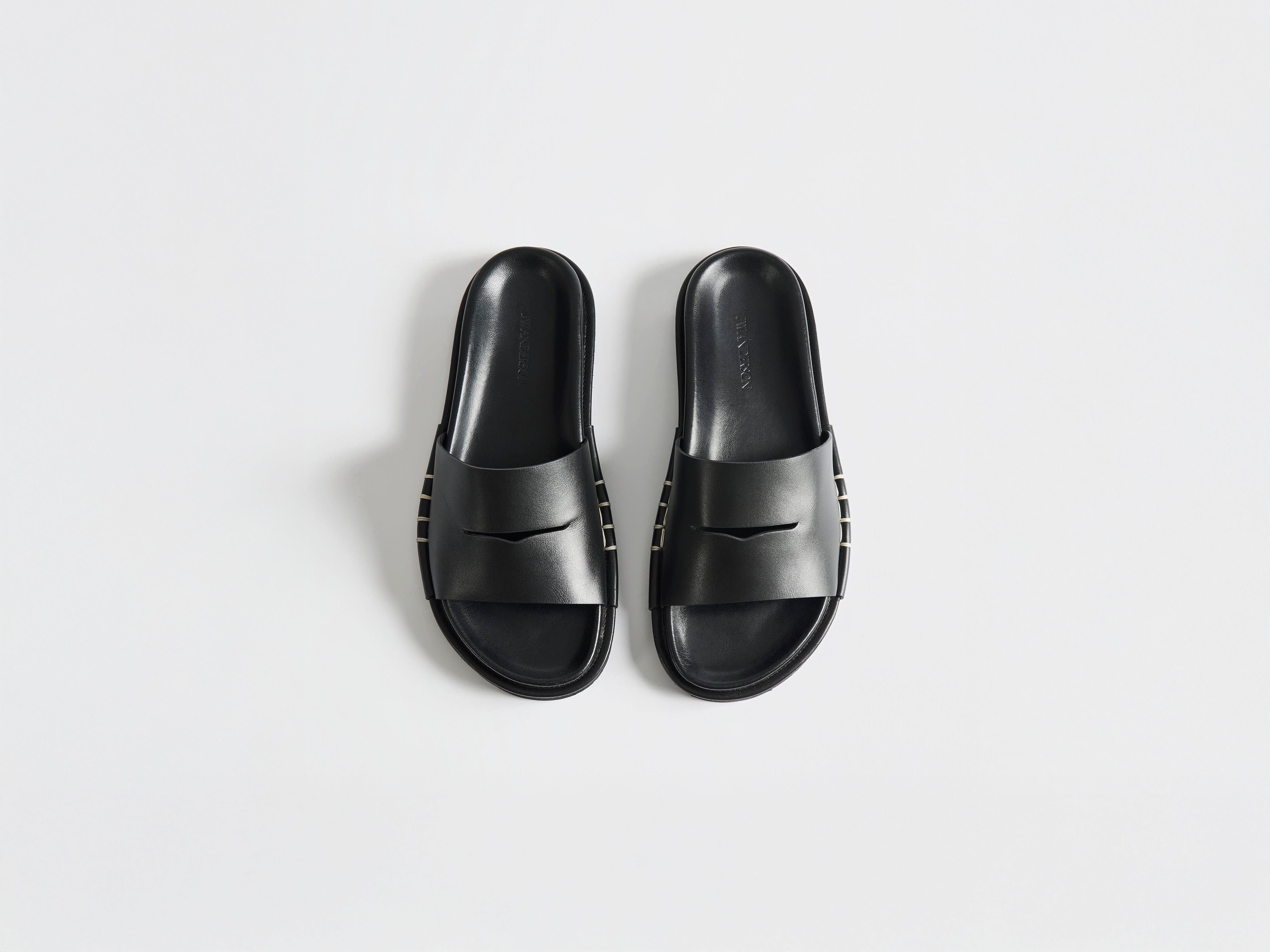 J.W.Anderson Fussbett Loafer Slides Schwarz Leder Herren