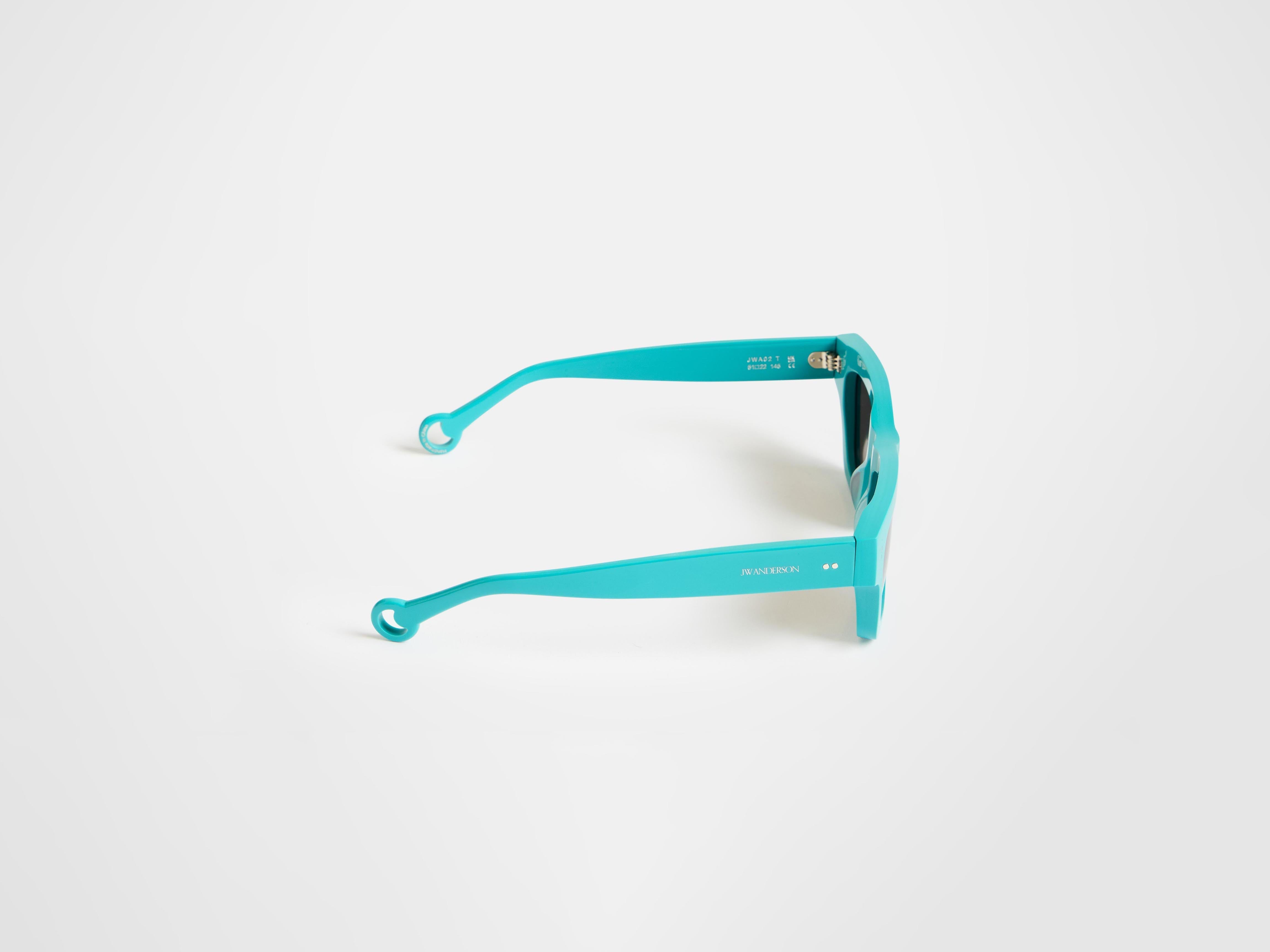 J.W.Anderson JWA02 Sonnenbrille Türkis rechteckig
