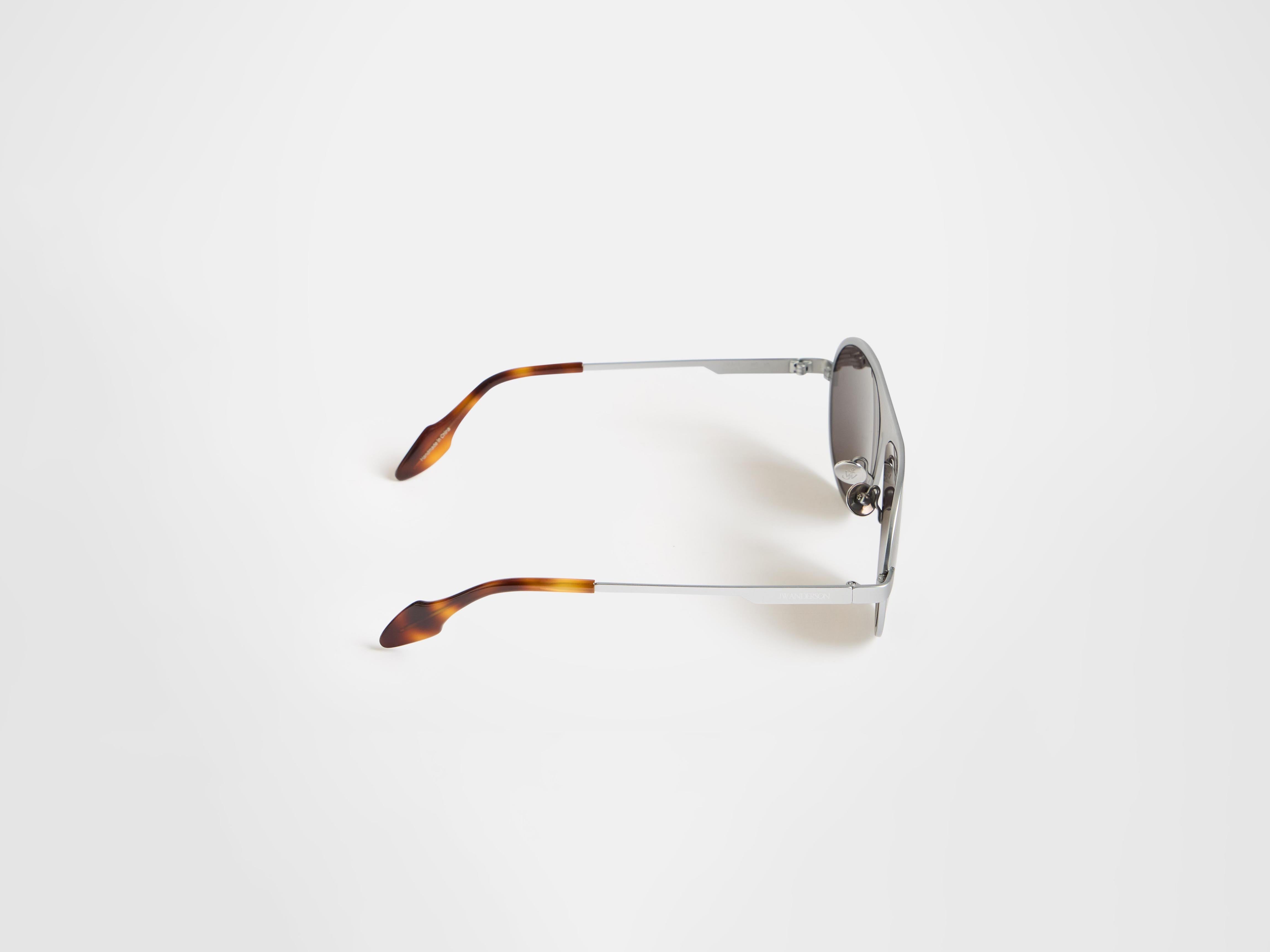 J.W.Anderson JWA05 Aviator Sonnenbrille Silber Titan