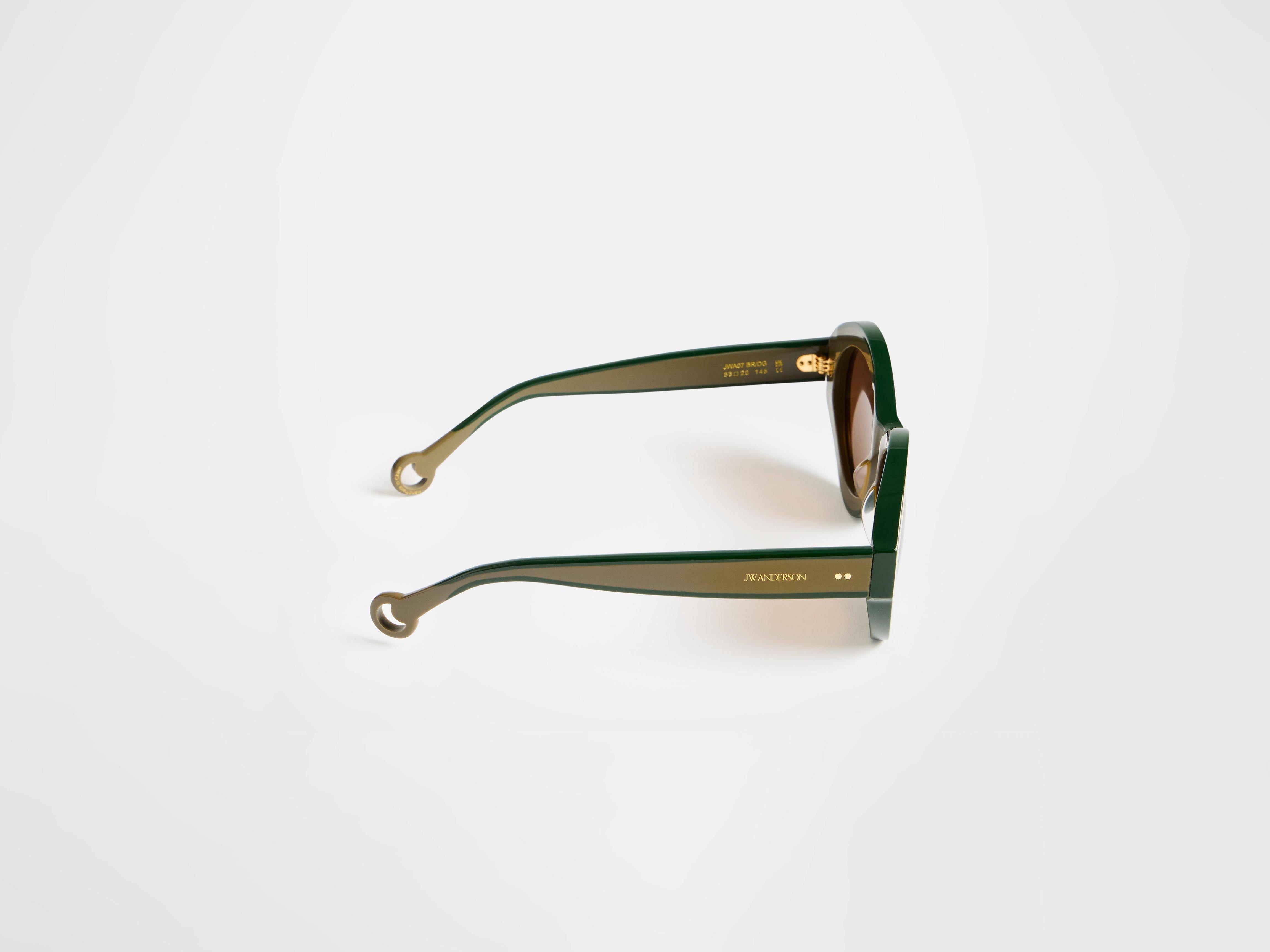 J.W.Anderson JWA07 Bumper Sonnenbrille Braun Grün Acetat