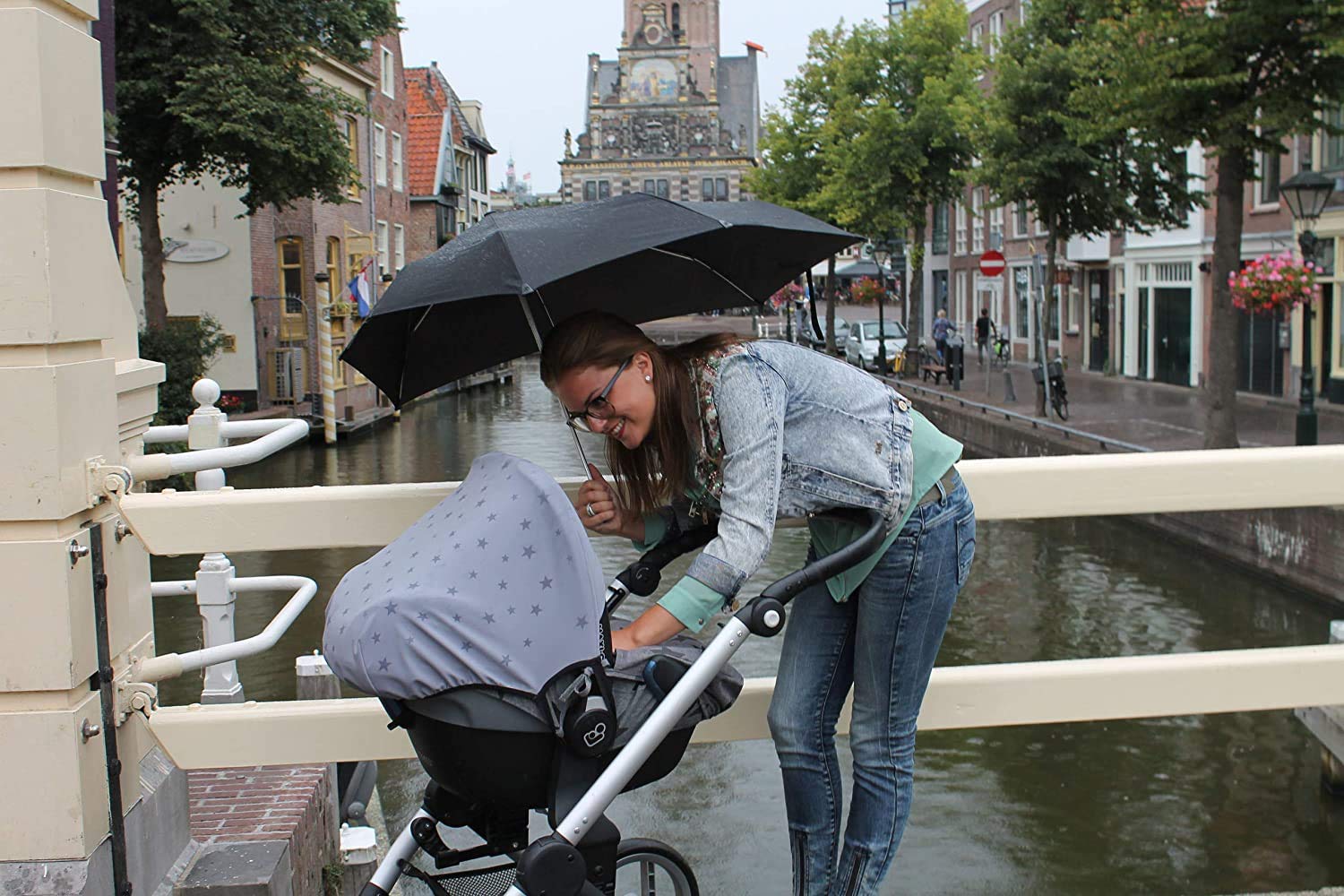 Dooky Hoody Magic Rain Sonnenschutz Babyschale 0+ Grau