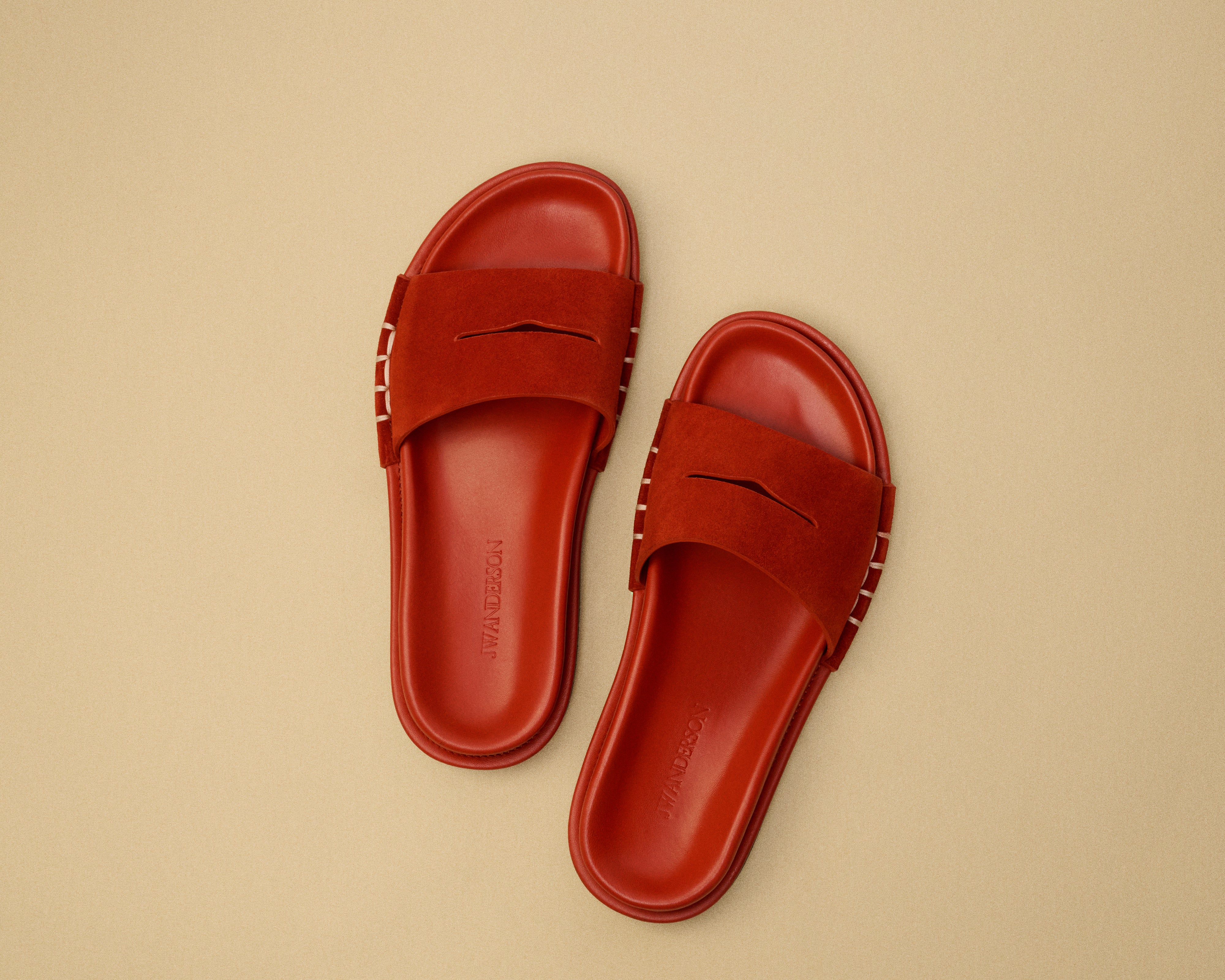 J.W. Anderson Fussbett Loafer Slides Rost Wildleder Herren