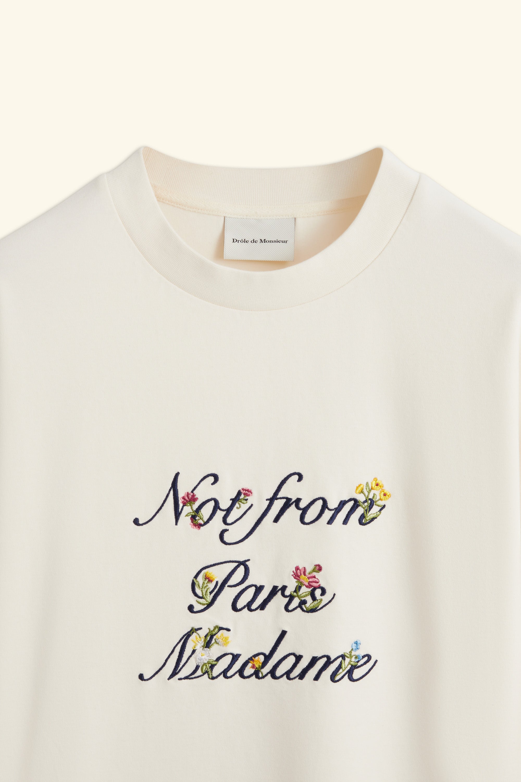 Drôle De Monsieur Le T-Shirt Slogan Fleurs Creme Baumwolle