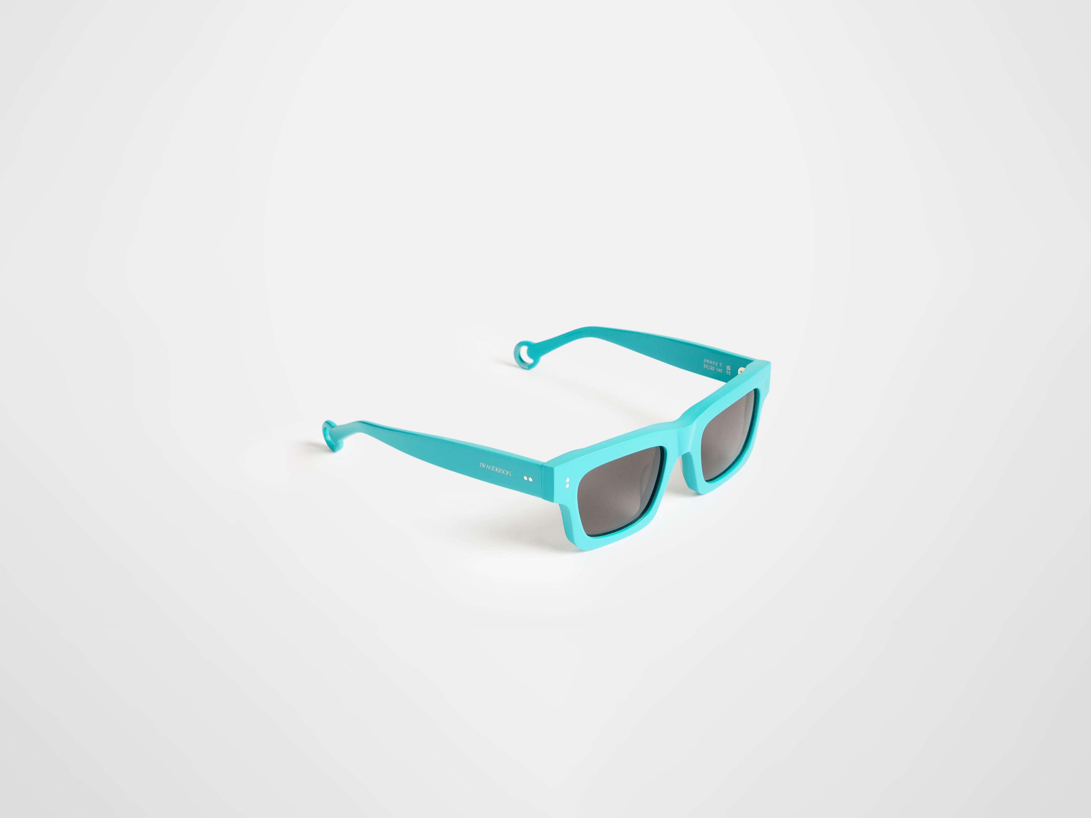 J.W.Anderson JWA02 Sonnenbrille Türkis rechteckig