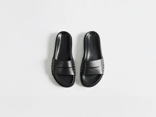 J.W.Anderson Fussbett Loafer Slides Leder Schwarz