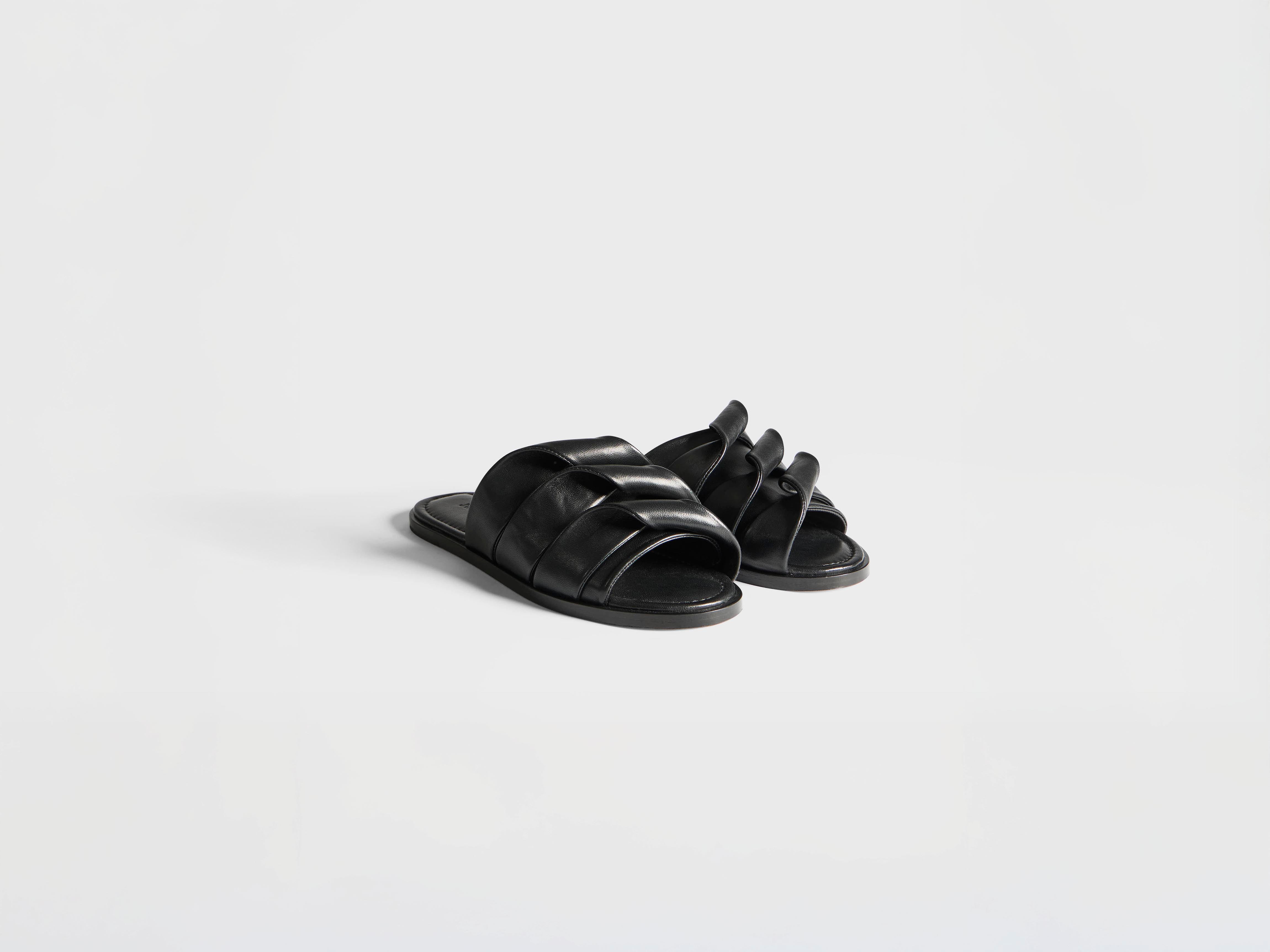 J.W.Anderson Shoes Contrasting Coil Slide Sandalen Schwarz Leder