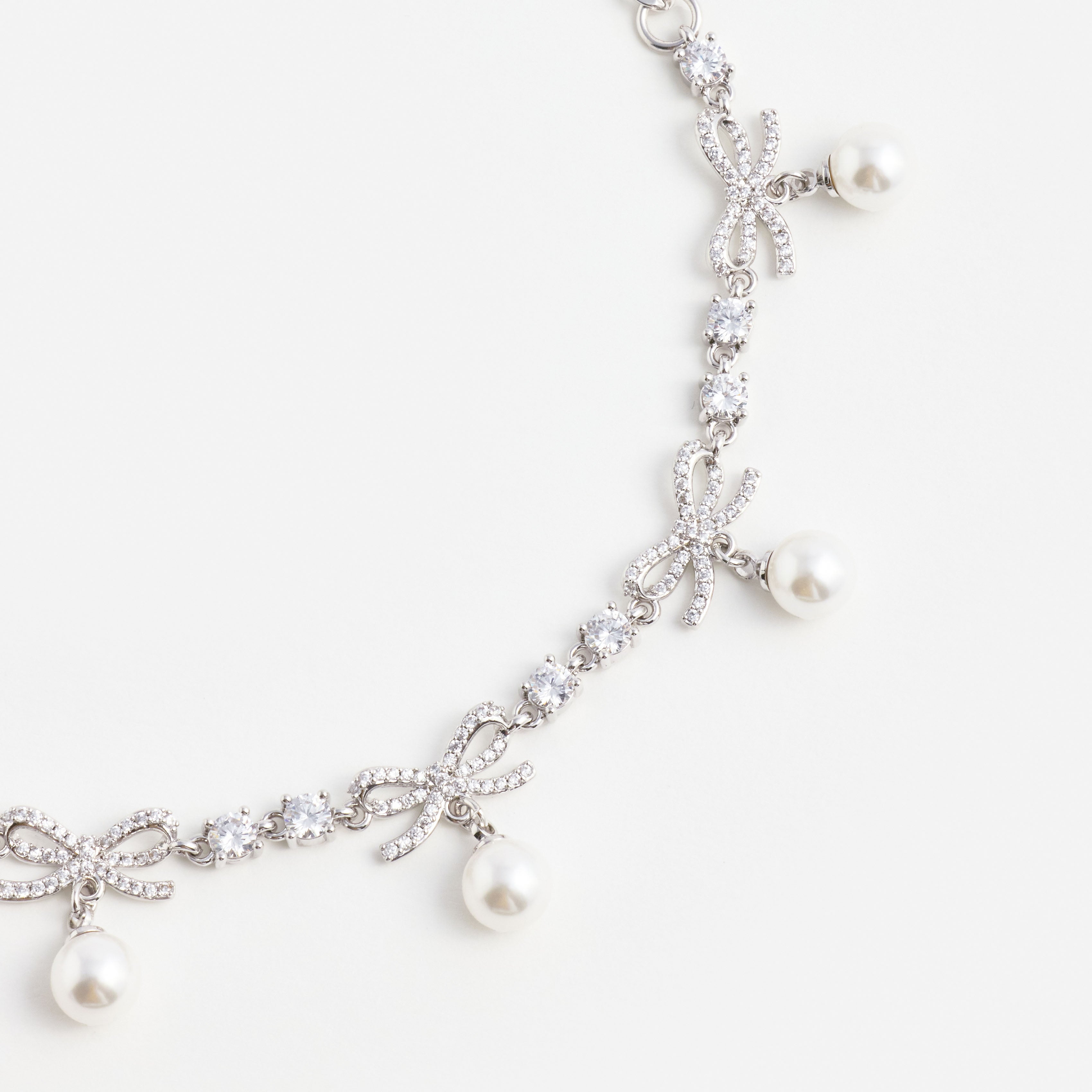 Self Portrait Crystal Bow Pearl Charm Armband Silber