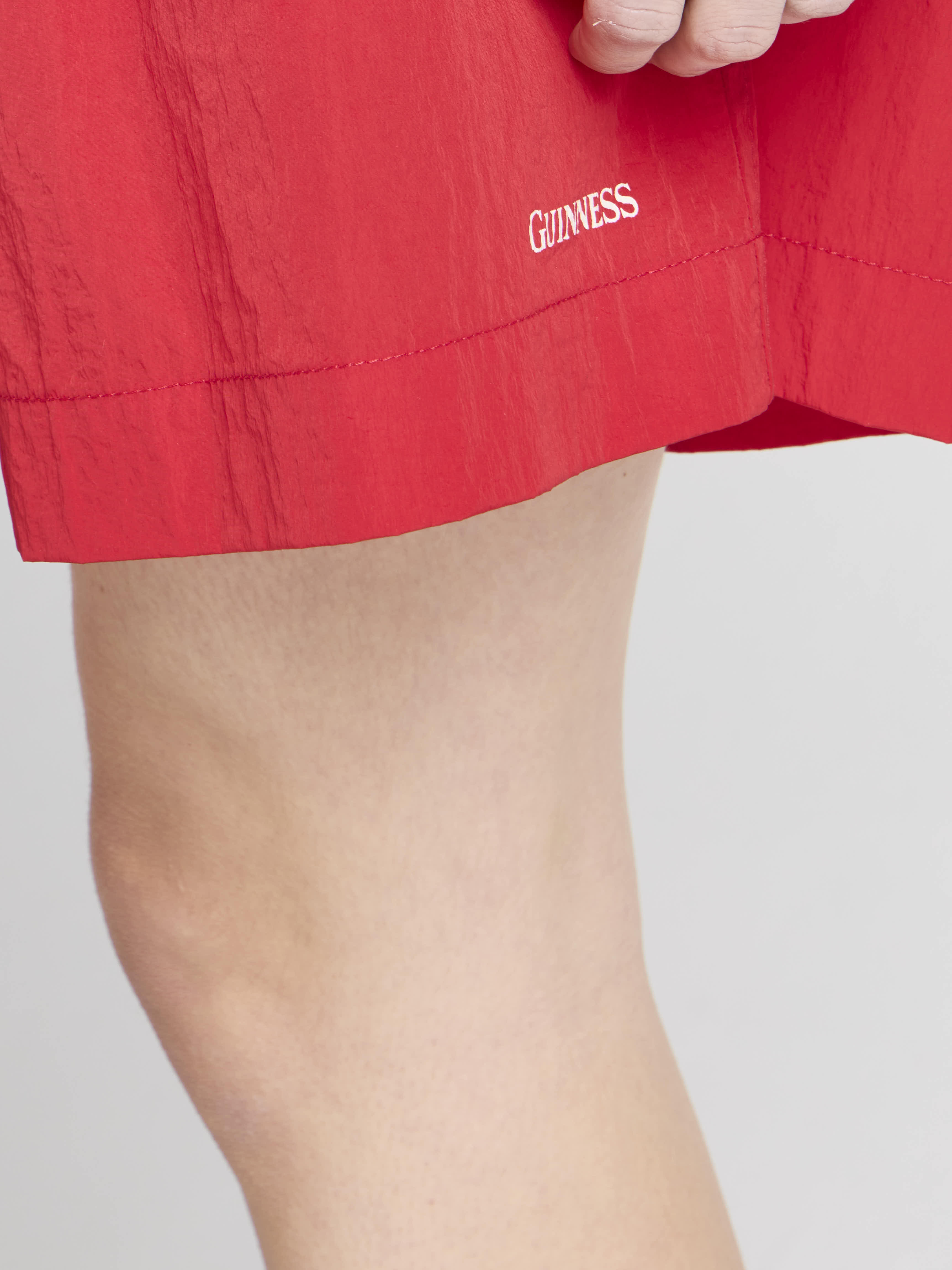 JW Anderson x Guinness Track Shorts Rot Unisex